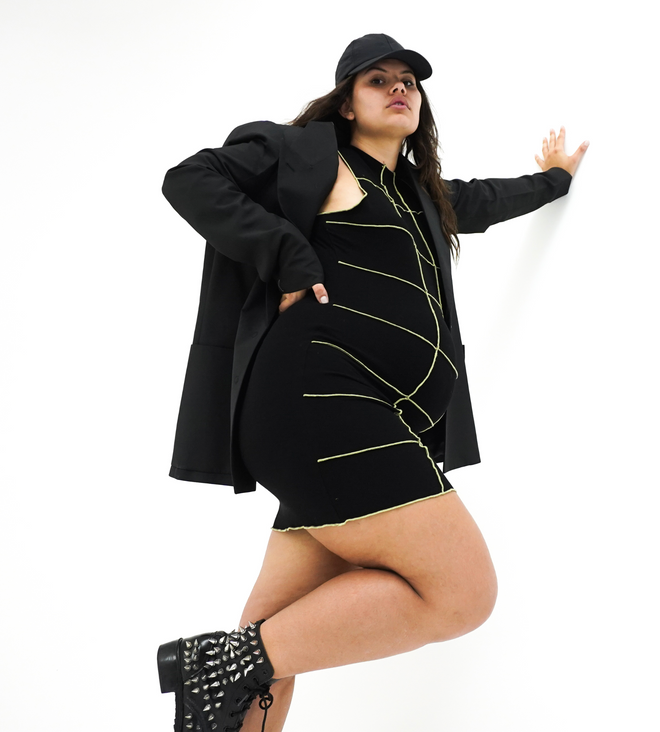 black dress for  the cutest maternity attire. lined with a lime green stitching to give it a sophisticated edge